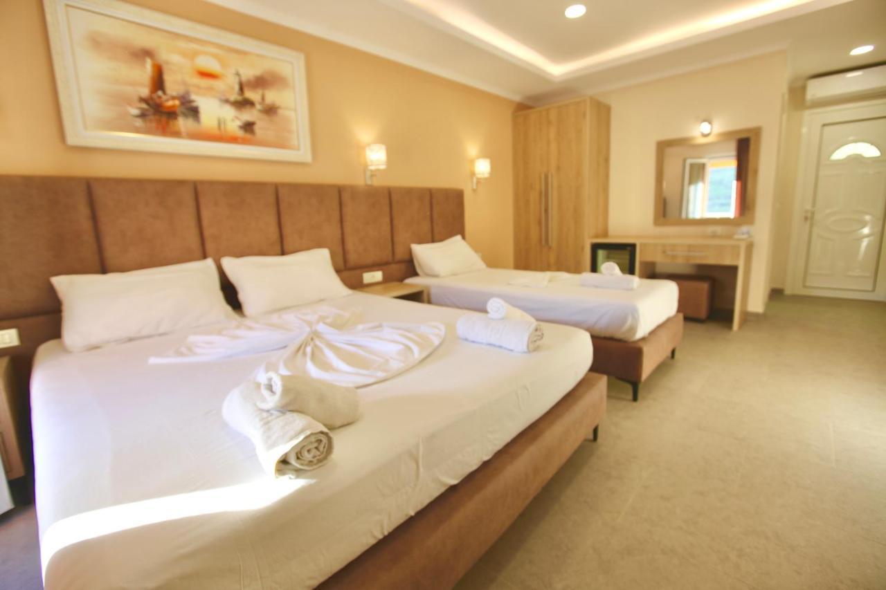 Karos Hotel Llaman ฮีมาเรอ ภายนอก รูปภาพ